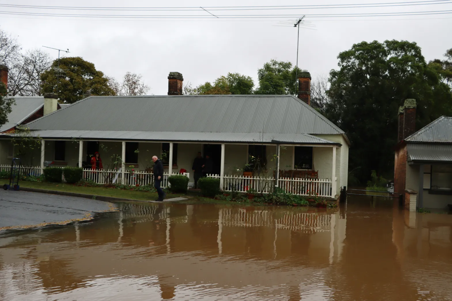 Flooded residential property with water outside